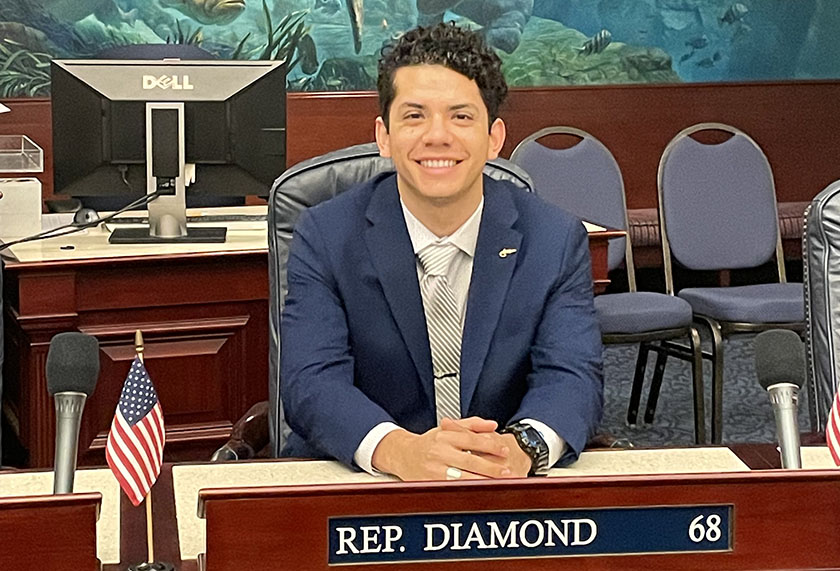 student intern sitting at state representative's desk