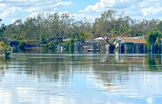 significant flood water present next to coastal houses in Florida