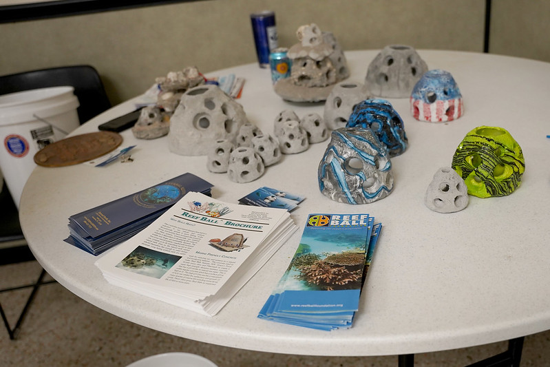 Reef ball modules on a table display.