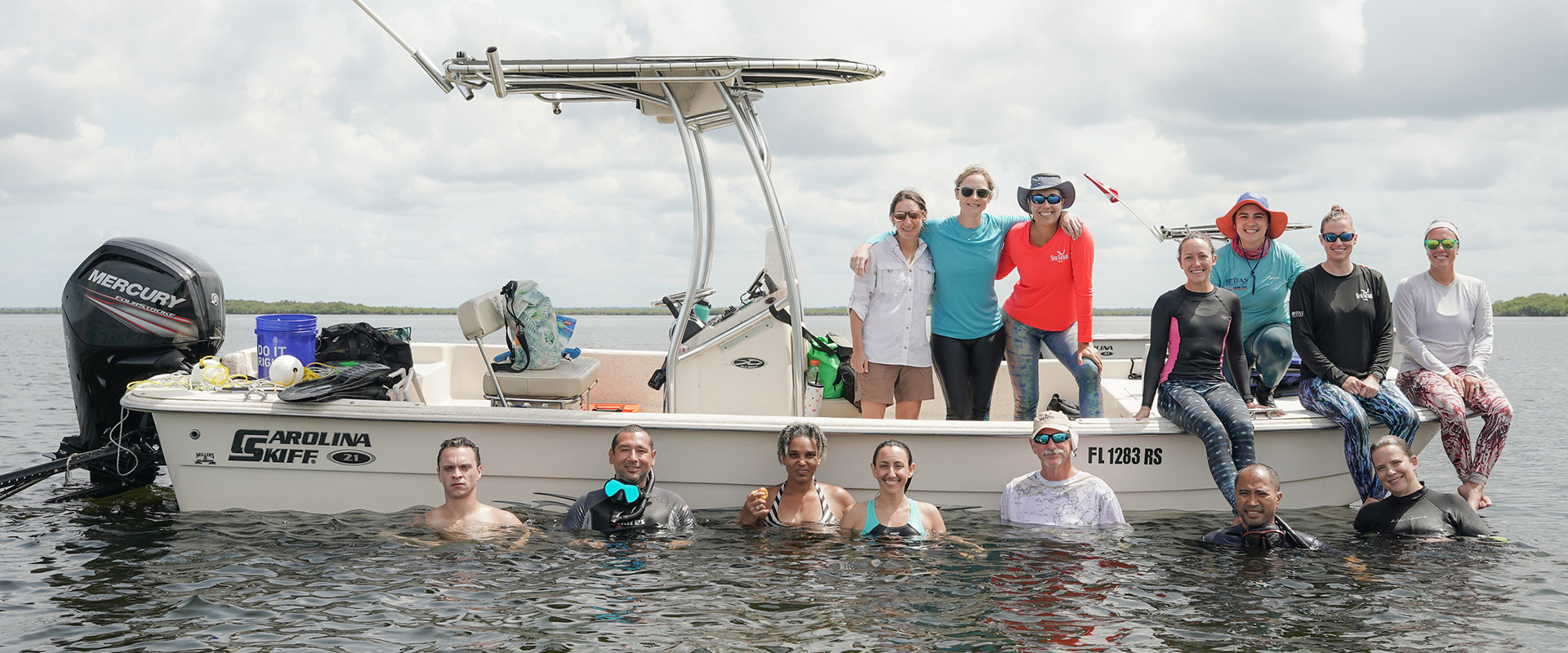 eyes on seagrass training team on boat in ocean