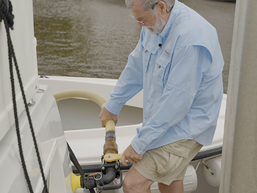 David Fuller, Northeast Florida Clean Boating Coordinator, pumping out boat sewage tank.