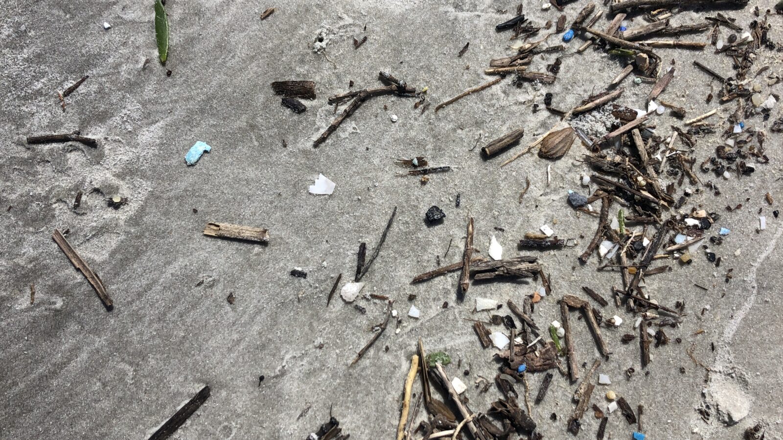 Beach trash on sand