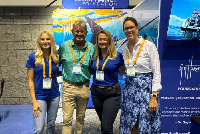 Alexis Mitchem and Susannah Cogburn with Dr. Guy Harvey