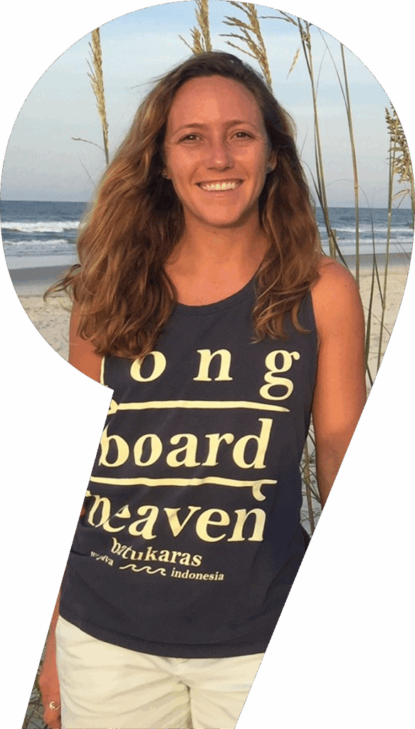 Carolyn Kovacs with sand dune and beach in background