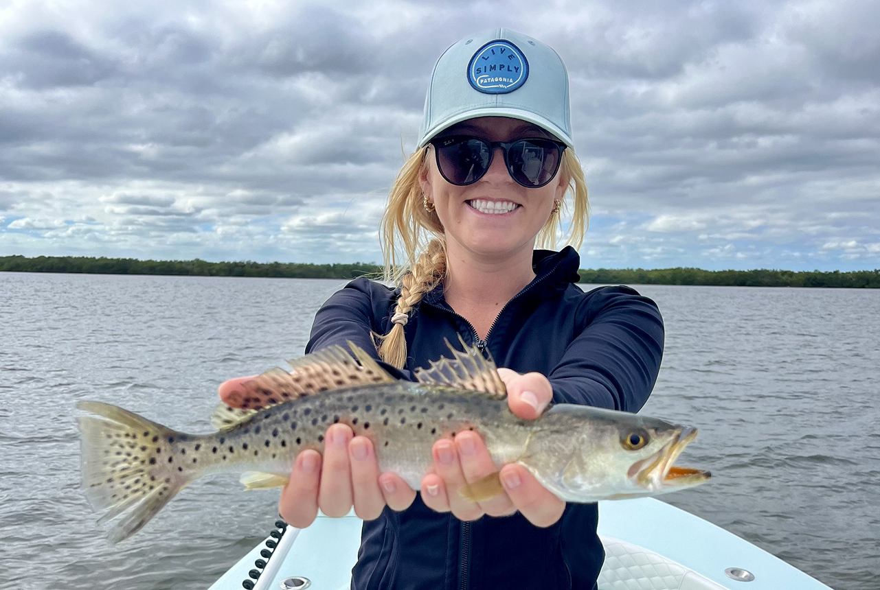 Hallie Repeta holding a Spotted seatrout