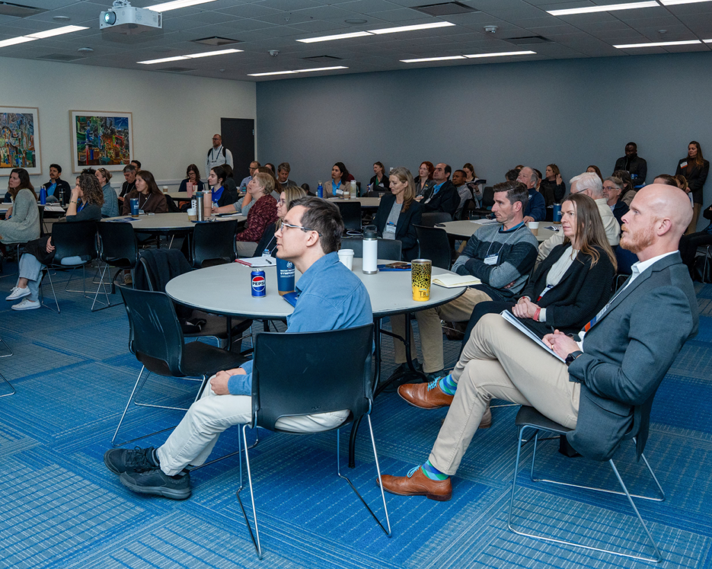 Audience listening to Jason Evans' presentation during a session on conveying
complex environmental
information to
non-scientists.