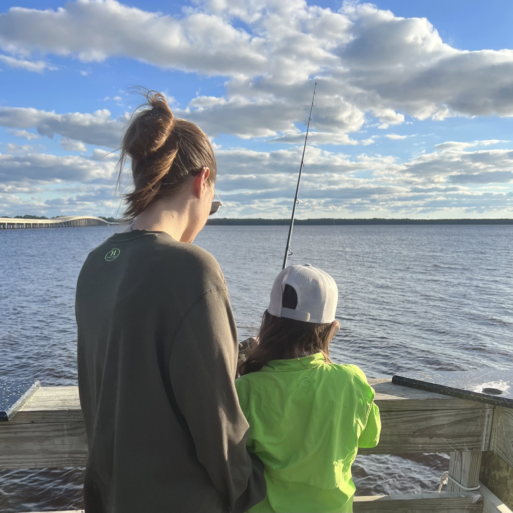 Dr. Cilano fishing with her kid.